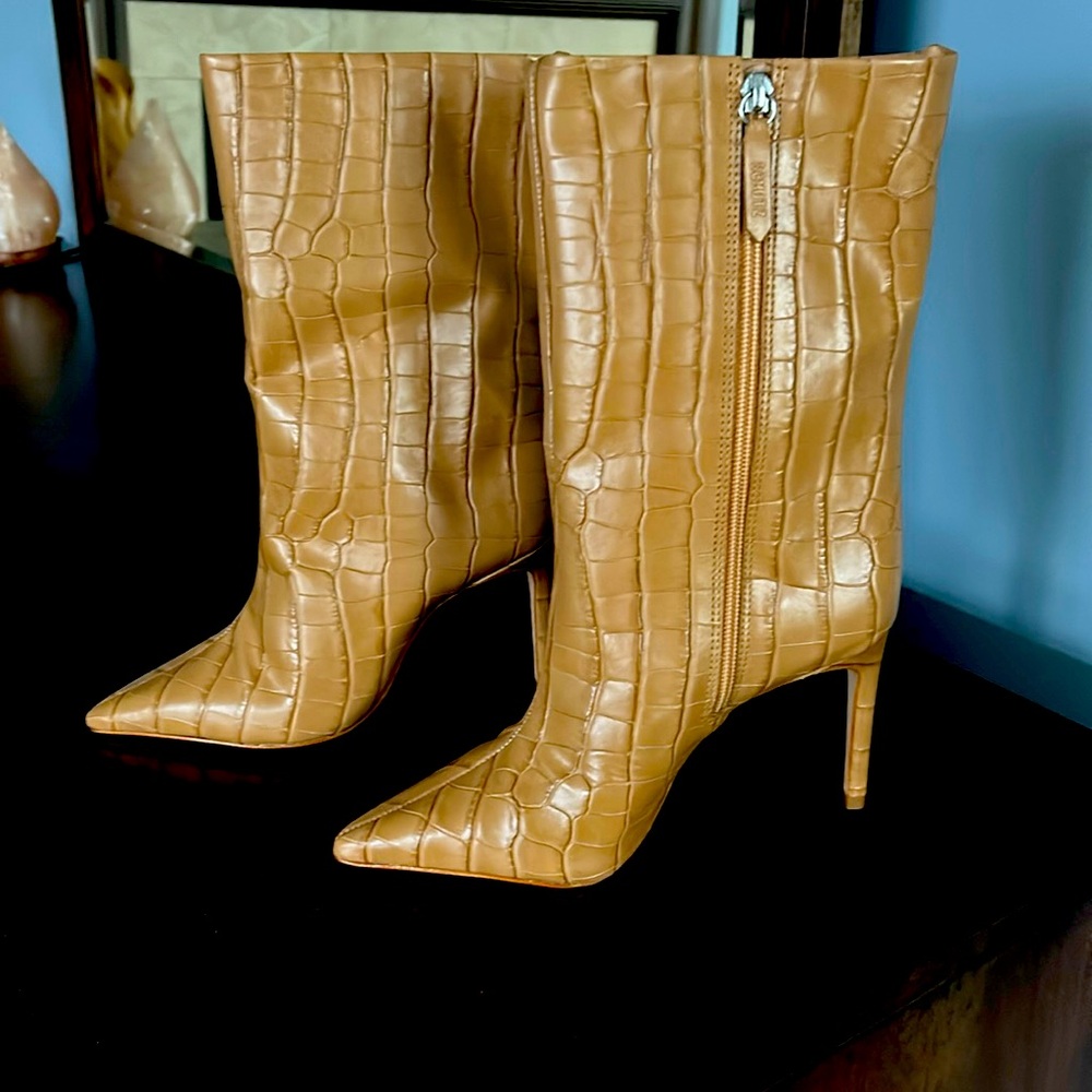 Schultz mid calf bootie. Size 6. 2” heel.
Wore once